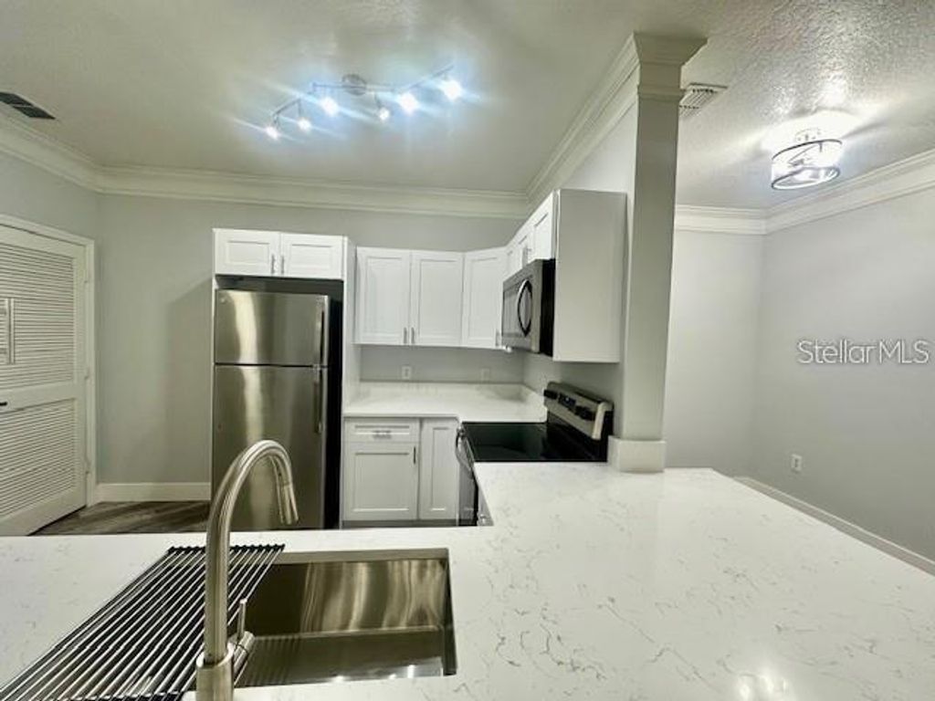 Photo of 8818 Villa View Circle #203, Orlando, FL 32821 (MLS # S5144055)