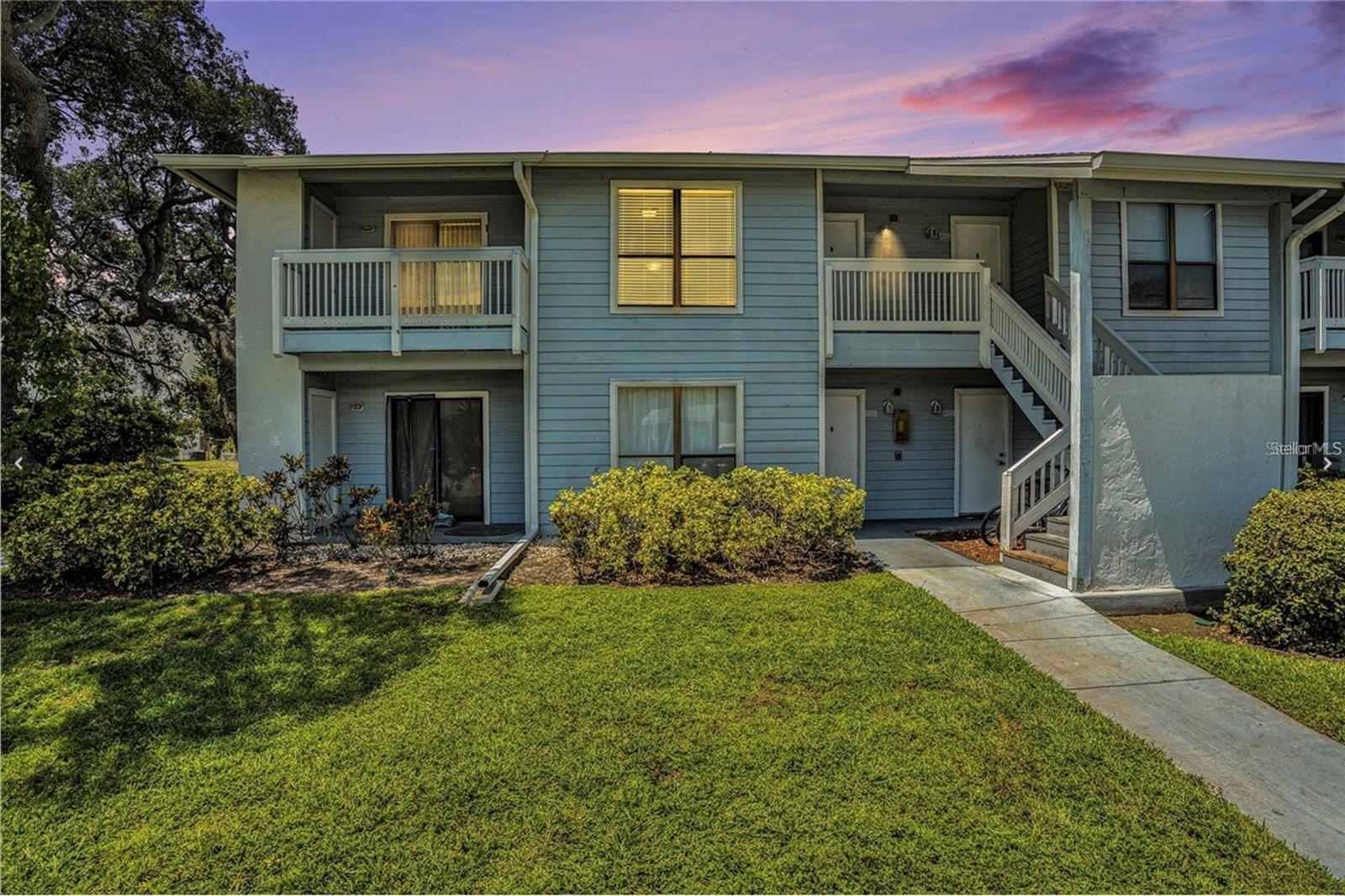 Discover your new home in this spacious one-bedroom, one-bathroom condo, perfectly situated on the second floor. Enjoy your morning coffee on the cozy porch, and relax in the generously sized bedroom featuring a walk-in closet that comfortably fits a king-size bed and full-size dresser. The inviting living space includes a comfortable couch with an ottoman and a lounge chair with a side table and lamp. Fully equipped kitchen with a dining area including a dining table that comfortably fits four chairs, and additional amenities include a closet by the front door and a bathroom equipped with a tub. Water, sewage, and trash are included for your convenience. Located on Alt 19, you’re just minutes away from the beautiful Dunedin Causeway, Ozona, and the lively downtown areas of Palm Harbor and Dunedin. Don’t miss out on this perfect blend of comfort and location! To schedule a showing, please refer to the showing remarks!
