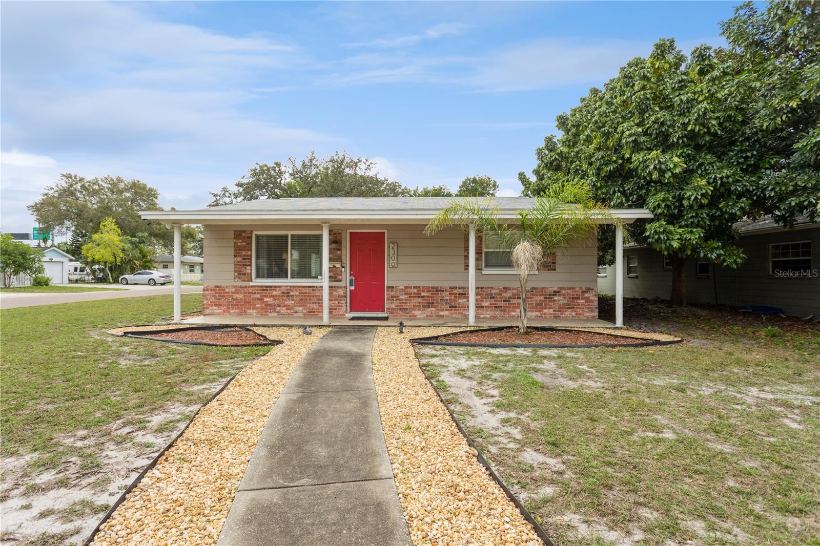 Welcome to your hidden gem in St. Petersburg! This delightful 3-bedroom, 2-bath home boasts over 1350 square feet of living space and is situated on an oversized corner lot in a quaint and quiet neighborhood. As you approach, a charming walkway leads you to the covered front porch and colorful entry door. Step inside your lovely home, and you'll discover a spacious and well-designed interior. The split plan offers plenty of room, providing both comfort and privacy. The timeless terrazzo floors add character to the space, creating a warm and inviting atmosphere. The primary bedroom has ceramic tile flooring, a walk-in closet, and an en-suite bathroom for added convenience.
The kitchen has been thoughtfully updated and features recessed lighting, stainless steel appliances, ample counter space, and a convenient breakfast bar. There is an additional living space adjacent to the kitchen to use as a dining area, office area, or media space. Whether you're hosting gatherings with friends and family or savoring a peaceful meal, this home provides the perfect space to accommodate both. Outside, the property's oversized corner lot and fenced in backyard space create a sense of openness you are able to enjoy from your rear covered and screened porch. If you need additional space a shed is included to fit your storage needs. Discover the ultimate convenience with this home's prime location. Situated in close proximity to major interstates, downtown St. Pete, restaurants, shopping destinations, beaches, entertainment and attractions, airports, St. Pete Pier, Tropicana Field, and more, it offers unparalleled access to the vibrant lifestyle that St. Pete and Tampa Bay have to offer. To enhance buyer confidence, the owner is generously offering a 1-year American Home Shield warranty. Don't miss the chance to make this exceptional property your own – schedule your showing today and embark on the journey to call St. Petersburg, your home!
Other: AC 2021; Washer/Dryer 2020; Roof 2020; Shed 2022; Windows replaced, not original, Google Nest Thermostat.