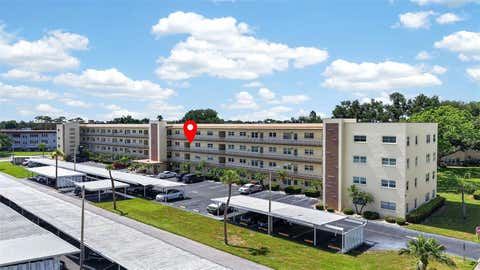 Photo of 5705 80th Street N #309, St Petersburg, FL 33709 (MLS # TB8527705)