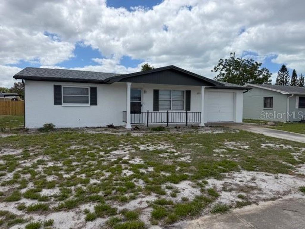 Photo of 3220 Huntington Road, Holiday, FL 34691 (MLS # TB8496213)