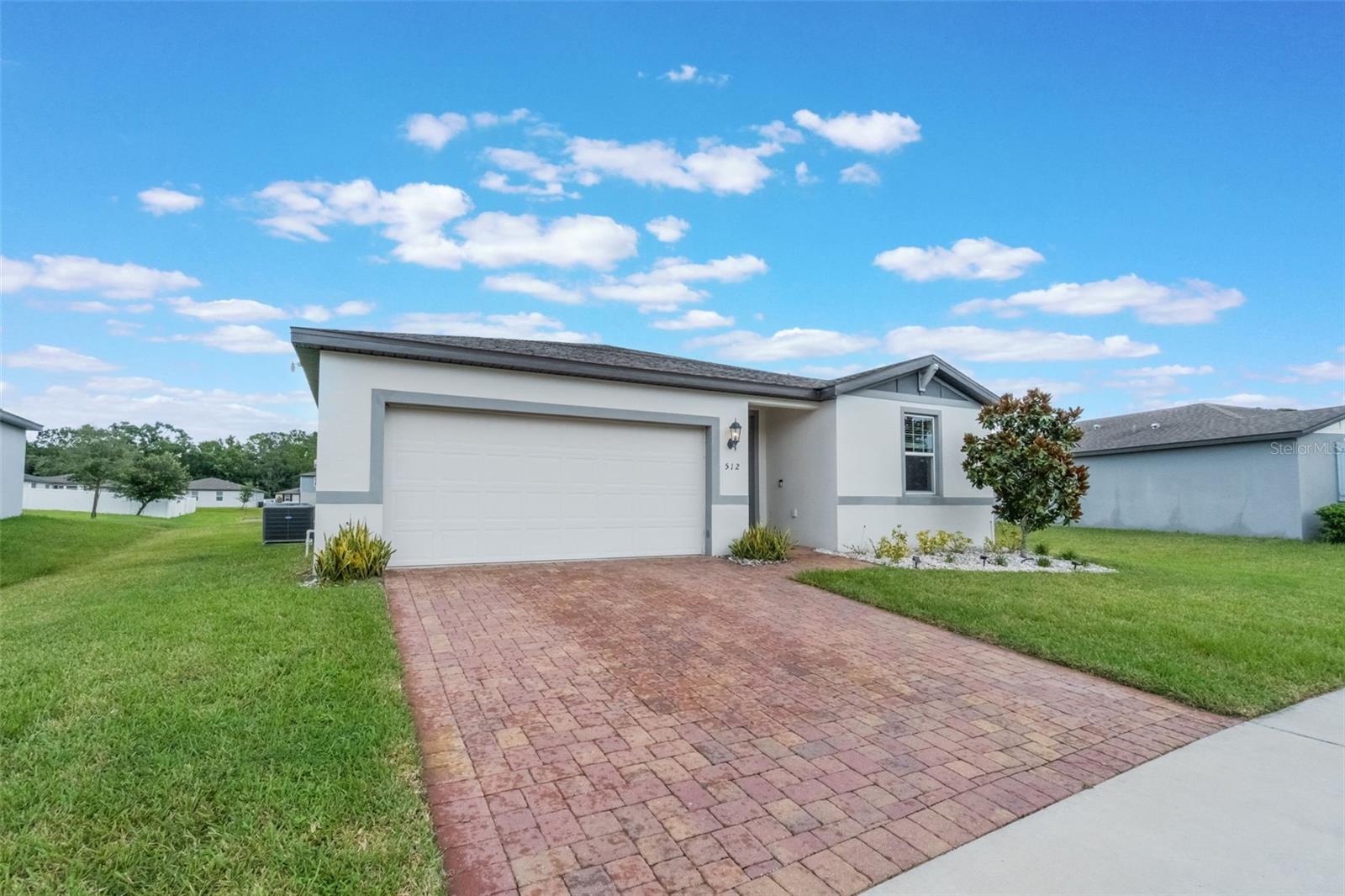Welcome to this beautifully maintained 4-bedroom, 2-bathroom 1823 sq ft, single-story home nestled in the sought-after community of Vistamar Villages in Davenport, Florida. With its generous layout and modern features, this home offers an ideal setting for relaxed Florida living. Step inside to find a bright, open layout that effortlessly connects the living, dining, and kitchen areas—perfect for gathering with friends and family. The split floorplan provides privacy for the primary suite, while the additional bedrooms offer plenty of space for guests, a home office, or a growing household. Located just a short drive from Central Florida’s top attractions—including Walt Disney World, Universal Studios, and SeaWorld, this home also puts you within easy reach of world-class dining, shopping, and entertainment. Golfers will appreciate nearby courses such as Champions Gate and Providence, while beach lovers can enjoy quick access to both the Gulf and Atlantic coasts. Don’t miss your chance to own a slice of the Florida lifestyle—schedule your private showing today and make this Vistamar Villages home yours!