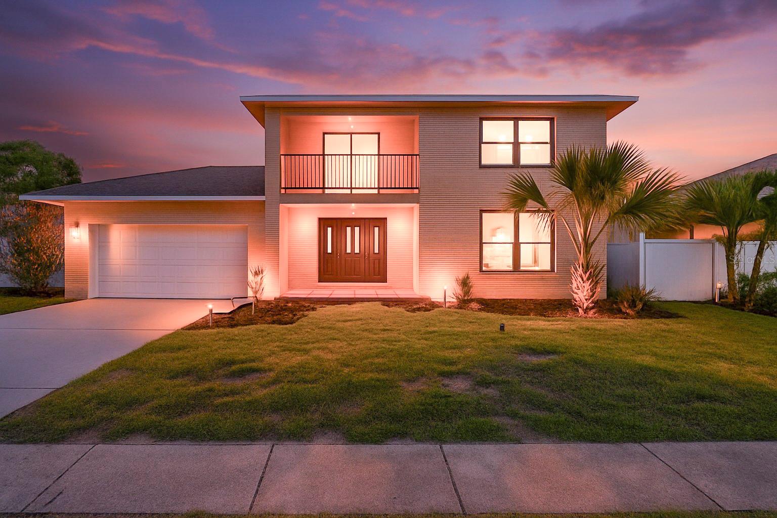 Located in the highly sought-after community of Golden Gateway in Tarpon Springs, this fully renovated 5-bedroom, 4-bathroom residence offers the perfect combination of elegance, comfort, and functionality. With 2,669 heated square feet and a total of 3,397 square feet of living space, this expansive home sits on a fully fenced 0.17-acre lot with no HOA, offering privacy and flexibility in a prime location. From the moment you enter, you’ll be greeted by brand new luxury vinyl plank flooring, high ceilings, and an open-concept layout that flows seamlessly throughout the home. The thoughtfully designed floor plan offers a blend of formal and informal living spaces, perfect for both entertaining and everyday living. The gourmet kitchen is a true showpiece, fully remodeled with quartz countertops and a complete suite of brand-new stainless steel appliances. Whether you're preparing a quiet meal at home or hosting a large gathering, this kitchen delivers both style and performance. All five bedrooms are generously sized and filled with natural light, thanks to large windows throughout the home. The yard is fully fenced, offering both privacy and safety for pets or children. The home also includes a detailed floor plan, which is available in the listing photos for easy reference. Located just minutes from the historic charm of downtown Tarpon Springs, top-rated schools, the famous Sponge Docks, Gulf beaches, and local dining, this home presents a rare opportunity to own a fully updated property in one of the area’s most desirable, HOA-free communities.