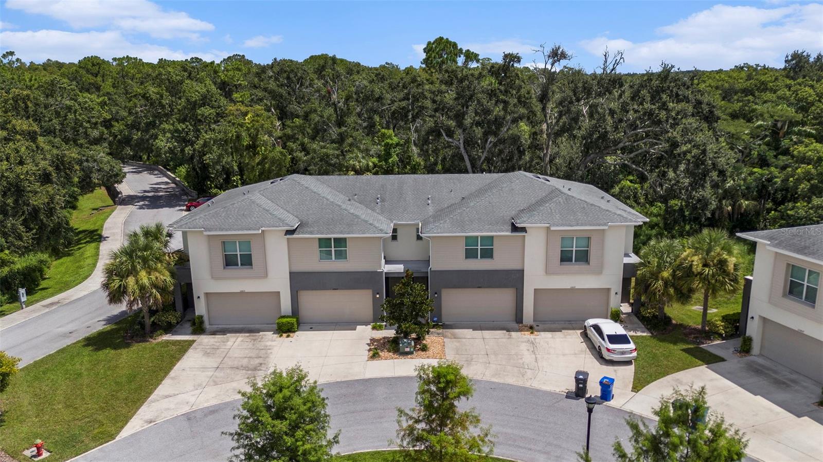 Welcome to The Sanctuary at Rocky Creek! This beautifully maintained townhome offers modern design, abundant natural light, and a flawless flow that truly feels like home. Featuring 3 bedrooms, 2.5 baths, a spacious loft, and a full 2-car garage, this residence is in exceptional condition and move-in ready.
Built with all block construction and hurricane-impact windows, the home lives like a single-family residence. Inside, you’ll find wood-look ceramic tile, volume ceilings, and an open layout perfect for entertaining. The chef’s kitchen boasts quartz counters, subway tile backsplash, an oversized island, walk-in pantry, stainless steel appliances, and stylish finishes—all overlooking the family and dining rooms. Upstairs, a versatile loft provides space for a home office, media room, or play area. The owner’s suite offers a custom accent wall, spa-like bath with quartz counters, dual sinks, and a walk-in shower, plus a generous closet. Secondary bedrooms are spacious and share a beautifully finished bathroom.
Outdoors, enjoy a private paver patio with peaceful wooded views and no rear neighbors or roads— the perfect setting to relax or entertain.
The Sanctuary at Rocky Creek is a boutique community of just 23 homes, offering serene conservation views while being minutes from top-rated schools, shopping, dining, parks, and major commuter routes. Only 10 minutes to Tampa International Airport, 15 minutes to Downtown Tampa, and 30 minutes to Clearwater Beach. This immaculate home won’t last—schedule your private showing today!