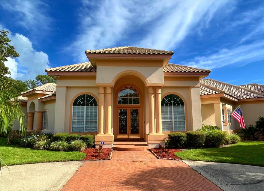 Builders own personal home on an oversized almost 1/2 acre corner lot located on a cul-de-sac.  Built by Peter Garrambone of American Builders and Developers.  Peter Garrambone built many homes in the area that include Brentwood Club and Bristol Park.  Property was originally situated on the lot to have an elegant circular driveway with fountain for a nice curb appeal.  Large amount of upgrades which include high 12' ceilings, 8' doors, central vacuum, 8 zone upgraded air conditioning system, water softener, oversized crown molding throughout, Faux painted accent walls, surround sound family room speakers, gas marble/granite fireplace with mantle, recessed lighting, dimmer controls, arched entryways, oversized receding pocket sliding glass doors, transom windows, eyeball ceiling lighting, built-in wall niche with cabinet, security motion sensors, designer floor outlets and wall switches, designer ceiling fans, elegant window treatments, knock down wall texture, floor electrical outlet, double pane windows, 16"x16" ceramic tile flooring, M&S AM/FM wall stereo system with multiple room speakers, designer chandelier, outside lanai storage room, Corian countertops, 4 burner Jenn-Air island cooktop, bar seating for 6, designer white kitchen cabinets, French pane cabinets, countertop appliance hideaway, under cabinet fluorescent lighting, 2 white double kitchen sinks, 2 garbage disposals, massive stainless steel GE "Cafe" refrigerator, ample planter space, privacy blinds, double built-in shelving niches with cabinets in the game room, window seating with storage, sunburst window, designer pool table chandelier, pass through window to outside summer kitchen for entertaining, double game room ceiling speakers, Carrier temperature sensors, pocket door to rear suite, upgraded landscaping package, relaxing front yard fountain, double pane windows, barrel tile roof, dual vanities, oversized laundry room, double front entry leaded glass doors, rear gutters, flower beds, rear pool screen enclosure, oversized 3 car garage, buried back yard propane tank, summer kitchen and much more.