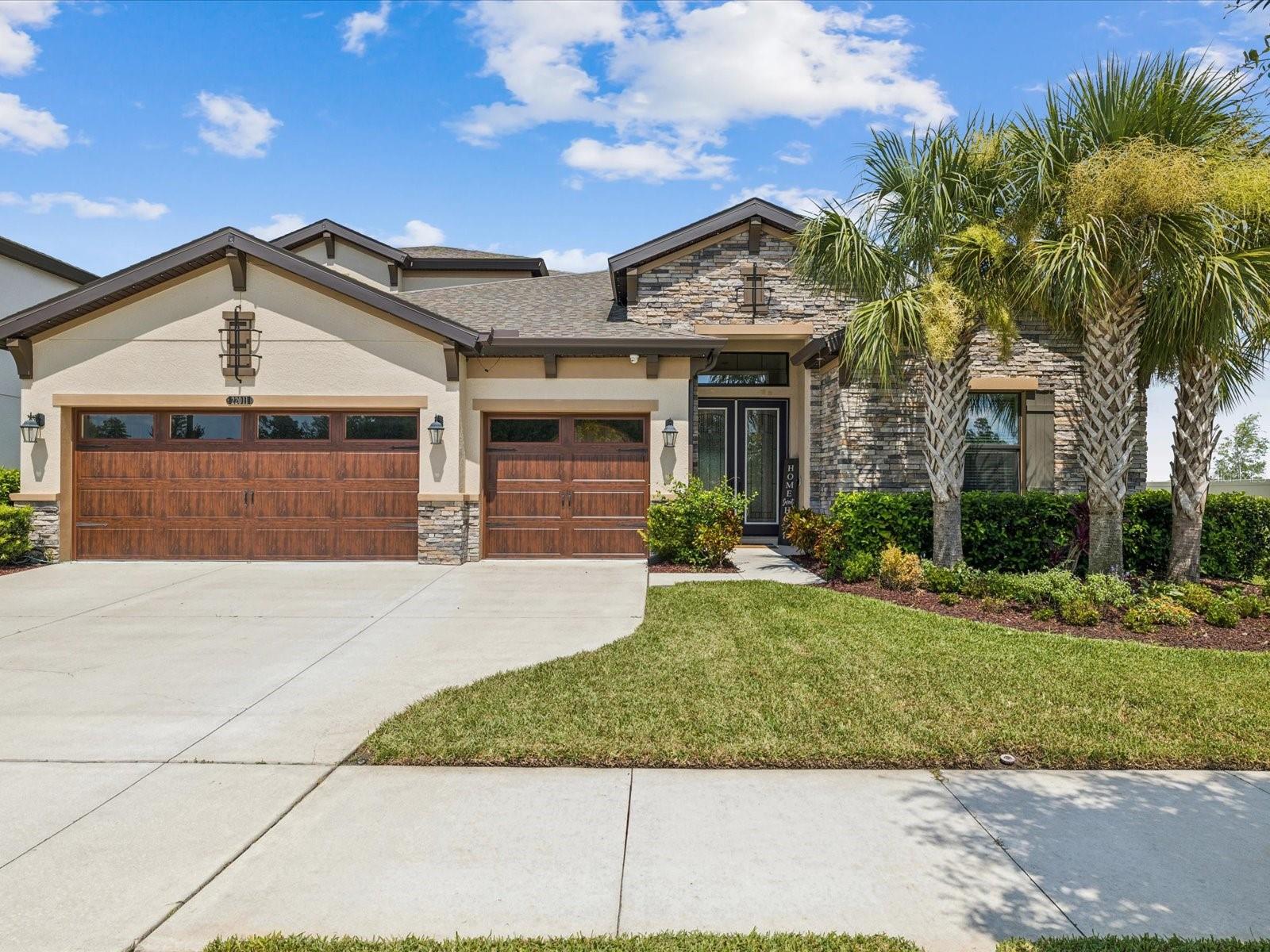 Luxury Living in the Heart of Connerton!
Welcome to this stunning 'Westbay Bayshore II' model home expertly designed for comfort, style, and seamless indoor-outdoor living. This thoughtfully crafted home offers over 3,200 square feet of elegant space, featuring 4 bedrooms, 4 full bathrooms, and a spacious bonus room upstairs for added flexibility.
Step through the stately entryway flanked by decorative columns and into a wide foyer that sets the tone for this exceptional residence. The open-concept layout connects a grand living room with dramatic ceiling beams, a striking stone feature wall, and built-in ceiling surround sound—perfect for entertaining or relaxing. Panoramic sliding glass doors with remote-powered blackout blinds extend your living space to the oversized covered lanai, creating a true indoor-outdoor experience.
The chef-inspired kitchen is a dream, featuring GE Café Bluetooth-enabled appliances, a wine fridge, and an expansive island that flows into the casual dining area. The outdoor kitchen elevates your hosting capabilities with a built-in natural gas grill, ice machine, fridge, sink, decorative lighting, and even Nebula outdoor landscape lighting surrounding the entire home.
Retreat to the luxurious owner’s suite with dual walk-in closets, a spa-like bath, and private pool access. Downstairs bedrooms and office showcase custom details such as shiplap, chair rail, murals, and decorative moulding. The home also features upgraded 6" baseboards throughout, adding a refined touch to every room.
Enjoy Florida living year-round in your private backyard oasis featuring artificial turf, an in-ground heated pool with waterfall and sun shelf, and a child safety enclosure for peace of mind.?
Additional upgrades include:
UV lights on both Carrier A/C units
Ecobee Bluetooth thermostat
RainBird Bluetooth irrigation system
Whole-house DuroMax portable generator
Upgraded sauna in garage
Built-in overhead and wall-mounted garage storage
Epoxy garage flooring
This is more than just a home—it’s a lifestyle. Located in the highly desirable Connerton community, known for its top-rated schools, resort-style amenities, and nature trails.
Don’t miss your chance to own this one-of-a-kind home. Schedule your private tour today!