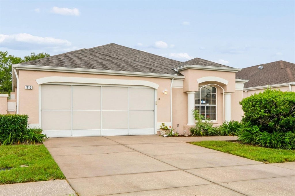 Photo of 312 Royal Palm Way, Spring Hill, FL 34608 (MLS # W7888458)