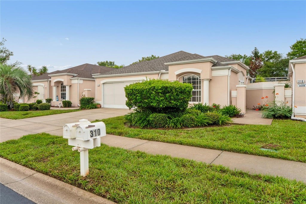 Photo of 312 Royal Palm Way, Spring Hill, FL 34608 (MLS # W7888458)