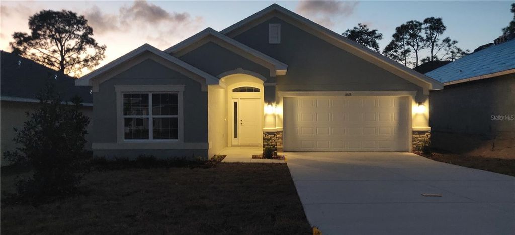 Photo of 5515 Ocean Breeze Drive, Spring Hill, FL 34609 (MLS # OM715379)