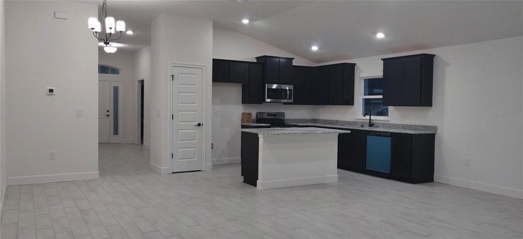 Photo of 5515 Ocean Breeze Drive, Spring Hill, FL 34609 (MLS # OM715379)