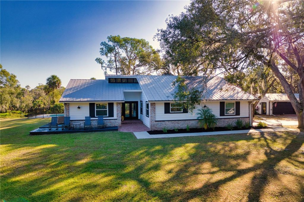 Photo of 5310 Jim Davis Road, Parrish, FL 34219 (MLS # A4669394)