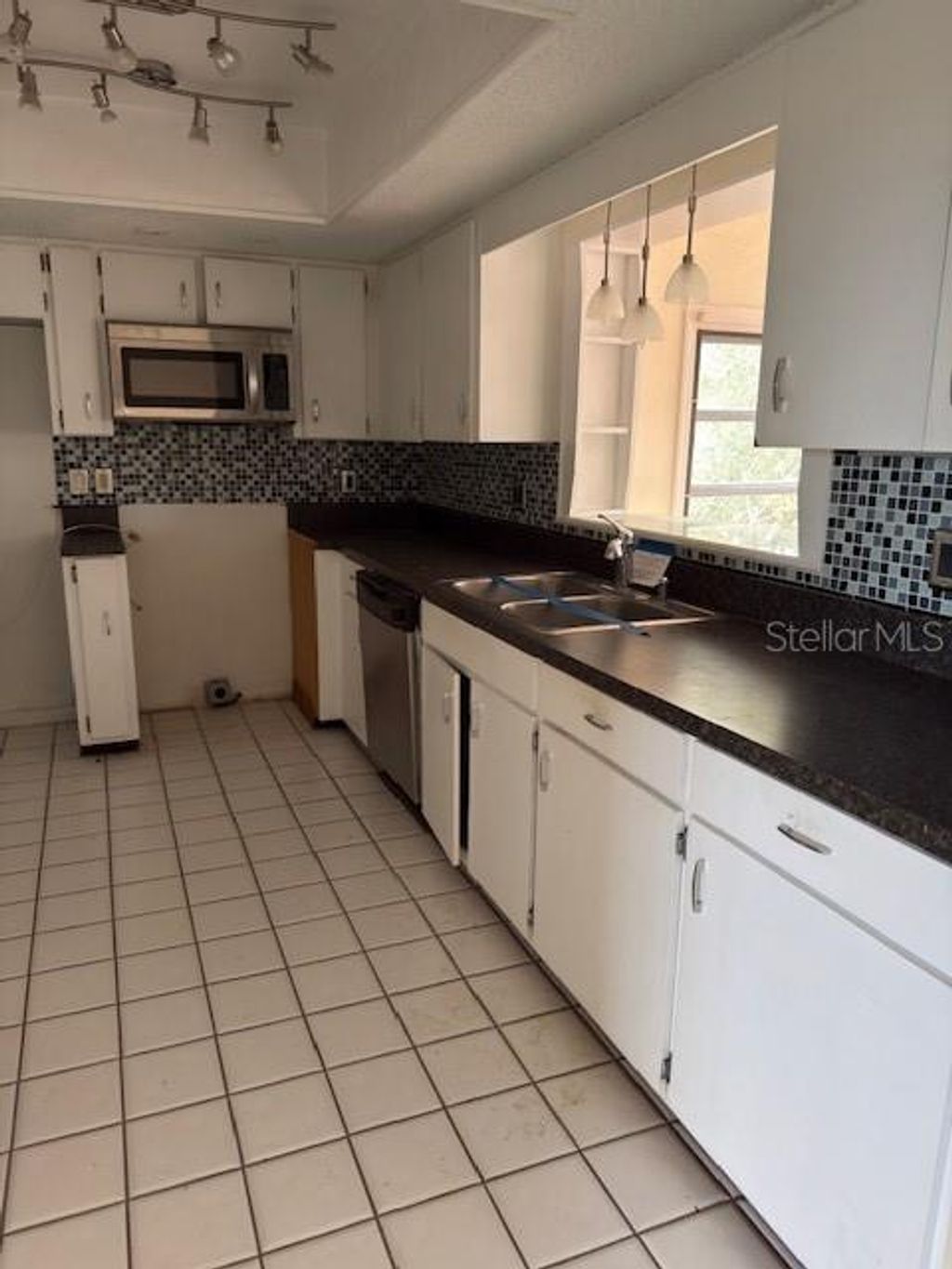 Photo of 2233 N Normandy Boulevard, Deltona, FL 32725 (MLS # O6380672)