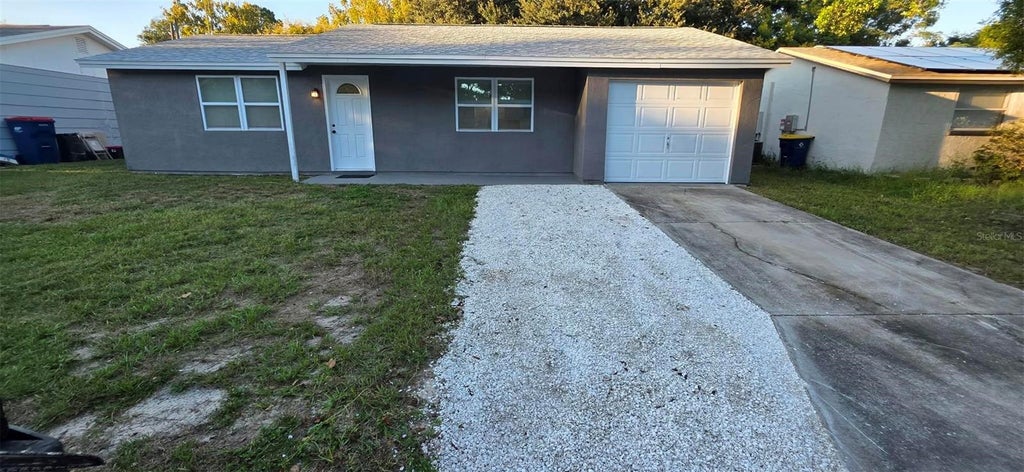Photo of 6407 Butte Avenue, New Port Richey, FL 34653 (MLS # O6450308)