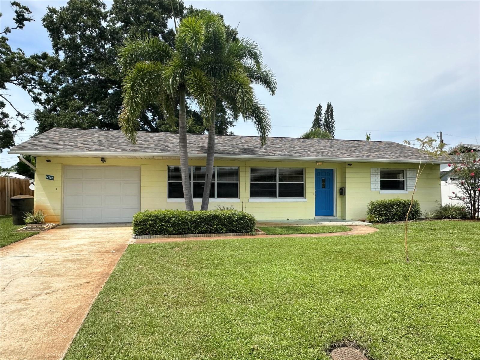 Nestled on a beautiful, quiet street in a HIGH & DRY location, this charming rental home offers comfort and convenience with thoughtful updates throughout. A BRAND NEW ROOF adds peace of mind, while the newly installed oven and microwave complement the full suite of stainless steel appliances. The welcoming front porch provides the perfect spot to enjoy your morning coffee or unwind in the evening. The grounds are impeccably maintained, featuring lush landscaping and a lovely shade tree in the backyard that enhances the tranquil outdoor setting. Inside, the home is exceptionally clean and move-in ready with no carpeting, featuring a mix of tile and beautiful wood-look flooring. The spacious kitchen is designed with bright white cabinetry and a sink that overlooks the large, private fenced-in backyard, perfect for both everyday living and entertaining. A large screened-in patio extends your living space and is ideal for relaxing or gathering with guests. It is sure to become your favorite spot this fall Additional highlights include indoor laundry, ceiling fans throughout, and a bathroom with a jet tub and a convenient step-in design. Architectural touches such as elegant cove ceilings add charm and character to the interior. New window screens have recently been added.. This home combines quiet residential living with functional upgrades and style, an ideal place to call home.