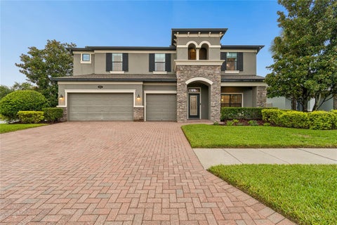 Photo of 1657 Feather Grass Loop, Lutz, FL 33558 (MLS # TB8534872)