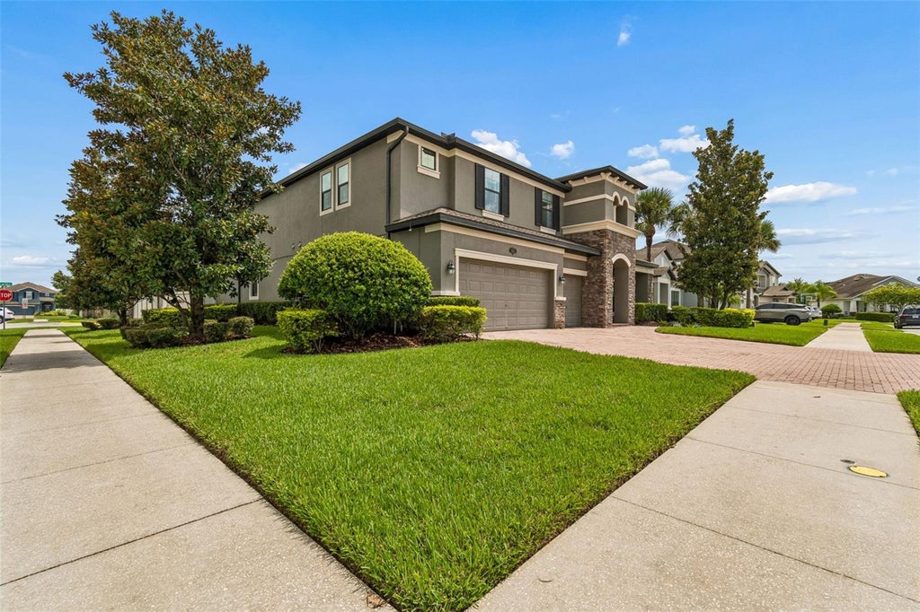 Photo of 1657 Feather Grass Loop, Lutz, FL 33558 (MLS # TB8534872)