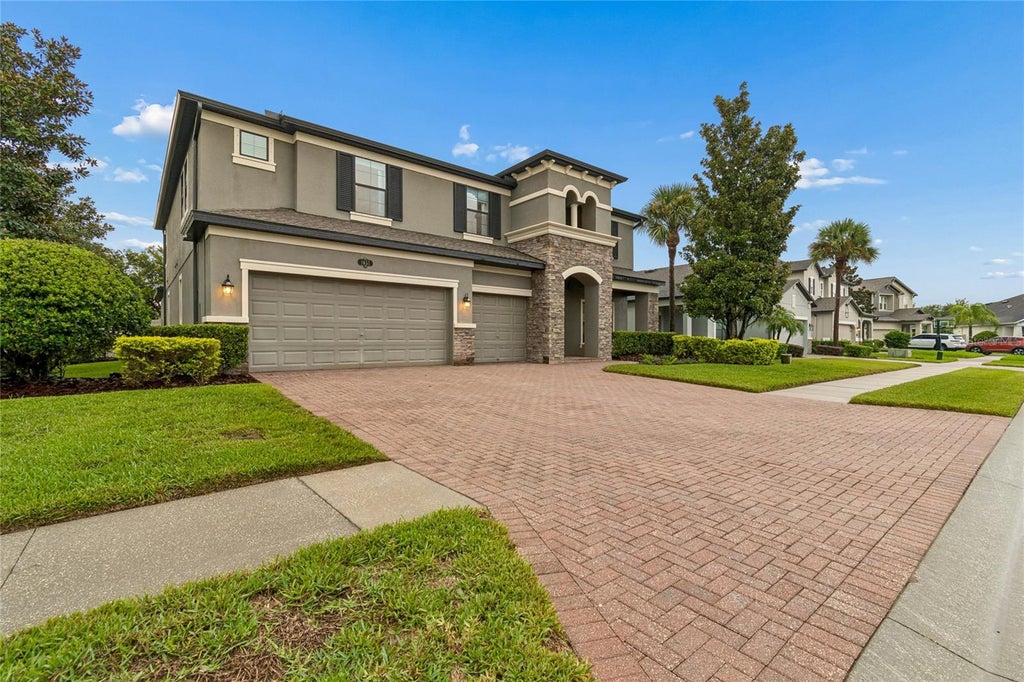 Photo of 1657 Feather Grass Loop, Lutz, FL 33558 (MLS # TB8534872)