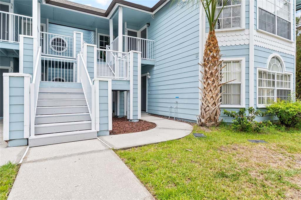 Photo of 2036 Royal Bay Boulevard #59, Kissimmee, FL 34746 (MLS # S5151690)