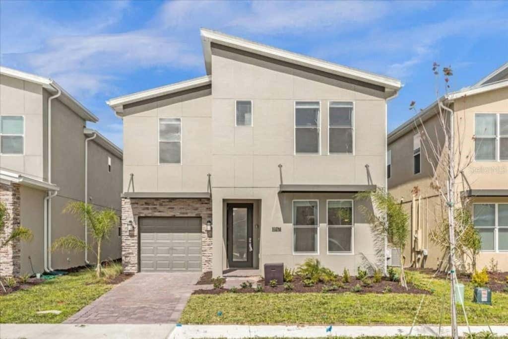 Photo of 8967 Play Through Dr, Davenport, FL 33896 (MLS # O6424024)