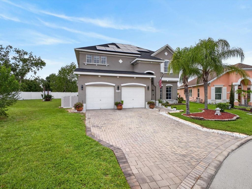 Photo of 2596 Sand Hill Point Circle, Davenport, FL 33837 (MLS # O6411388)