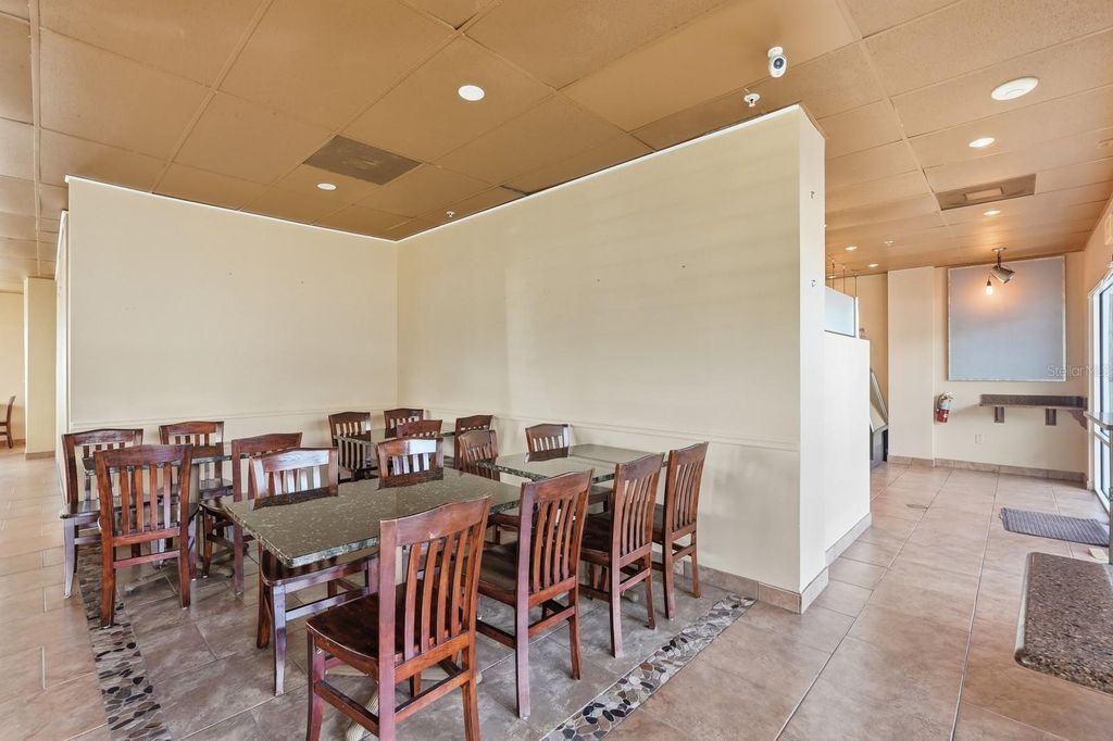 Photo of 160 Cypress Point Parkway #D101, Palm Coast, FL 32164 (MLS # FC313547)