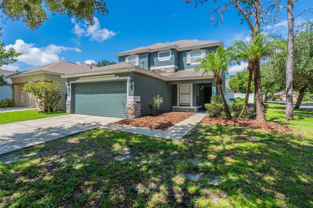 Photo of 5601 Tanagergrove Way, Lithia, FL 33547 (MLS # O6330207)