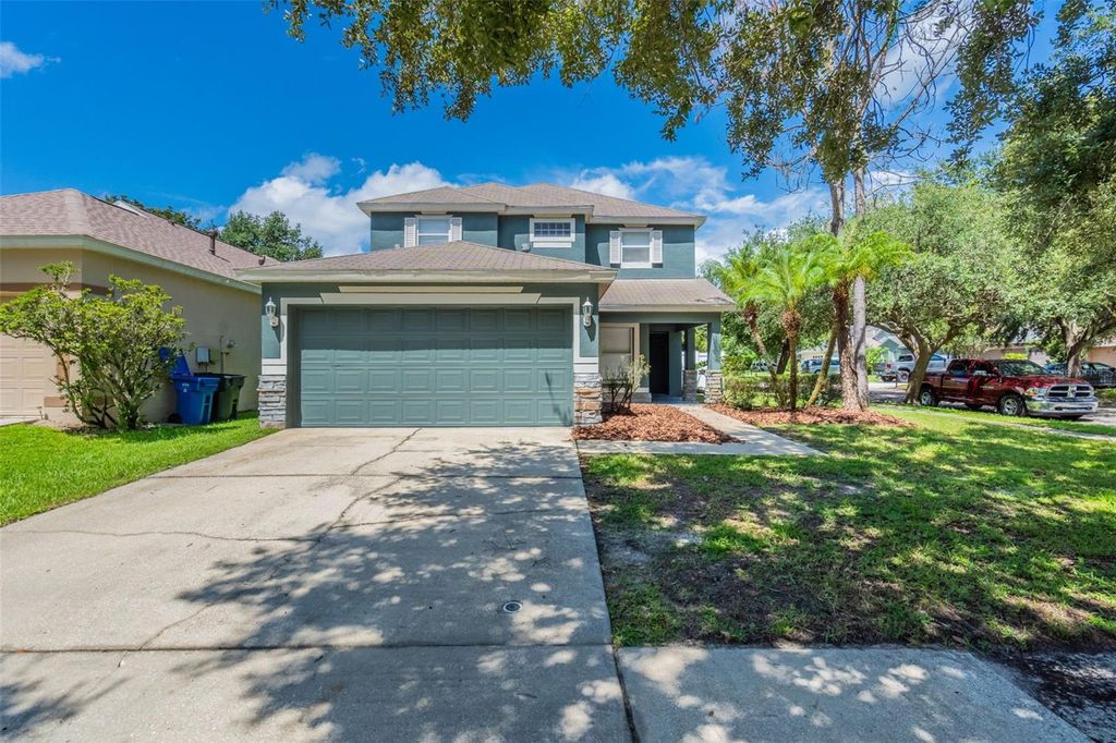 Photo of 5601 Tanagergrove Way, Lithia, FL 33547 (MLS # O6330207)