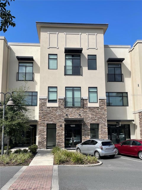 Photo of 13550 Village Park Drive #345, Orlando, FL 32837 (MLS # S5153297)