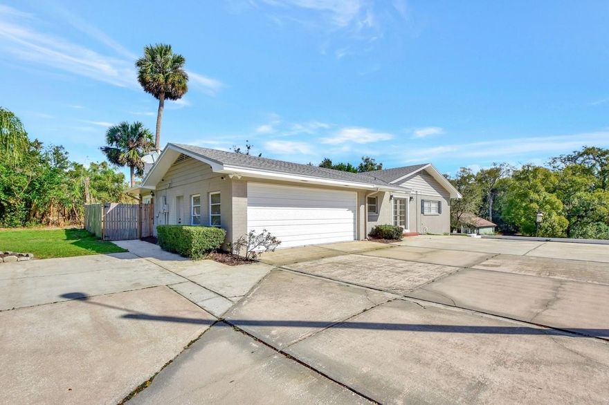This classic MID-CENTURY home sits on a 1.35-acre property comprised of four street-to-street lots, all with no HOA—perfect for bringing your RV, boat, and other recreational toys. Offering 2,878 square feet of living space, the home features an oversized screened pool surrounded by a well-maintained grassy yard ideal for outdoor entertainment and relaxation.
The thoughtfully designed split floor plan includes three bedrooms and three full baths, with excellent flow throughout. A versatile basement provides the perfect space for a recreation room, media room, home office, or additional storage. Beautiful original terrazzo floors enhance the Great Room and the 2nd and 3rd bedroom, while a stunning wall-to-wall custom bookshelf highlights your love of books in the main living space.
Additional highlights include an oversized garage with extra storage closets and timeless 1960s character throughout. 
Zoned R-3, this property allows for chickens and offers the flexibility to add an in-law suite or ADU, making it a rare opportunity for space, versatility, and mid-century charm.
ROOF in 2020, SEPTIC DRAIN FIELD replaced in 2019, TANKLESS HOT WATER HEATER in 2020, NEW WINDOWS ADDED for added energy efficiency. Zoned R-3 so those chickens you have been wanting this is your opportunity. This property can give you the space to add an In-law suite or an ADU.
Living in DeLand means being part of a vibrant, welcoming community rich in history and alive with arts and culture. Residents adore the charming downtown, where brick-lined streets invite you to browse unique shops, dine at locally owned restaurants, and explore the bustling farmers market. Just moments away, Stetson University infuses the area with youthful energy and cultural events. 
Nature lovers will appreciate nearby Lake Beresford Park and the State Parks in our area, offering endless opportunities for hiking, kayaking, and wildlife watching. For travelers, the location is unbeatable—easy access to I-4 connects you to Orlando, Daytona Beach, and beyond, while the DeLand Amtrak station makes regional travel simple.
Discover the charm, convenience, and community spirit that make DeLand one of Florida’s hidden gems—a perfect blend of small-town living with big-city access.