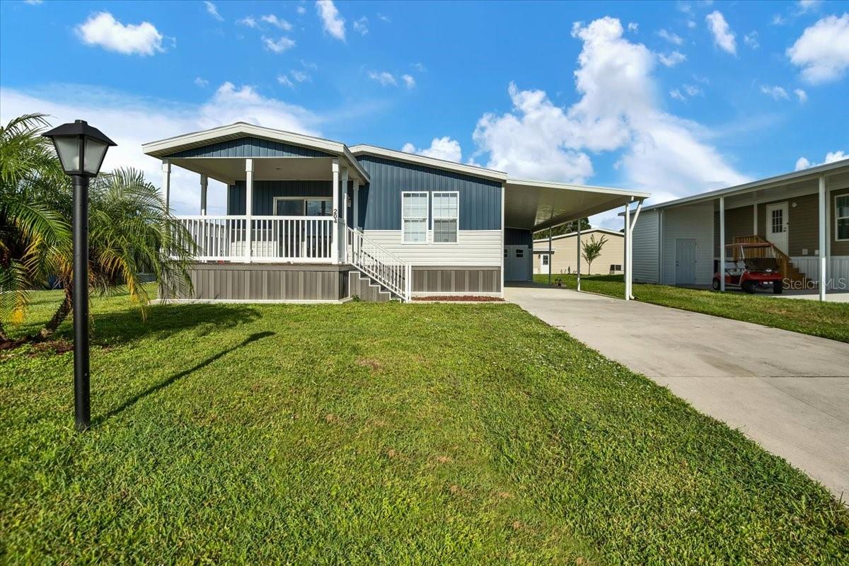 Welcome to this stunning brand-new 2024 Jacobson home, move-in ready and designed with modern comfort in mind. Offering 2 bedrooms, 2 bathrooms, and a versatile den, this thoughtfully crafted home features 1,372 sq. ft. of living space. The inviting front porch adds to its charm, while inside you'll find a bright open layout with wood cabinetry, luxury stainless steel appliances, double pane insulated windows, and a hidden walk-in pantry. Built with today's hurricane codes in mind, the home has 2x6 exterior walls for added durability, plus interior washer and dryer hookups for convenience.
Additional highlights include a 12' x 12' golf cart shed with access doors and plenty of storage, along with peace of mind from multiple warranties: 1 year full-service on the home and AC (with 5-year parts), 10-year structural, 20-year shingles, and 1 year on appliances. Financing options are available for qualified buyers. Why settle for used when you can own brand new with warranties included?
Located in La Casa, a quiet 55+ community nestled between Sarasota and Fort Myers, residents enjoy a serene lifestyle with natural beauty all around. The neighborhood is filled with mature trees, spacious green spaces, and eight picturesque lakes. Community amenities include two clubhouses, two heated pools, a boat ramp with access to the Gulf of Mexico, a recreation center, and a wide variety of social activities and events. Whether you're looking for an active lifestyle or a peaceful place to relax, La Casa offers the best of both.