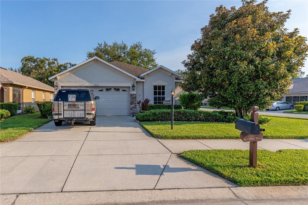 Photo of 18630 Rolling Hills Loop, Hudson, FL 34667 (MLS # TB8419759)