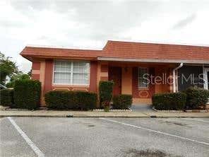Photo of 2929 W Oak Ridge Road #E8, Orlando, FL 32809 (MLS # O6428915)
