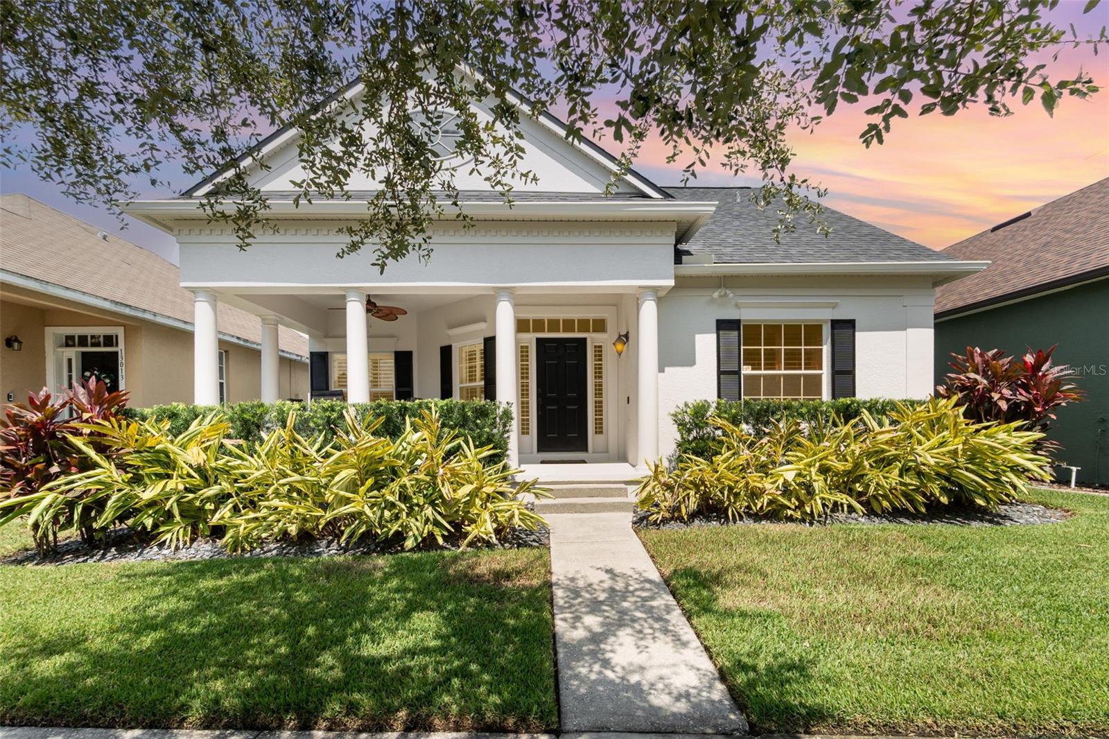 Gorgeous, wonderfully renovated POOL HOME located just ONE block from Avalon Park’s shops and restaurants is ready for new owners! This 3 bedroom, 2 full bathroom property has incredible renovations throughout. NEW ROOF 2021, NEW KITCHEN 2021, NEW FLOORING, INTERIOR PAINT, FENCING, LANDSCAPING - ALL 2021, NEW EXTERIOR PAINT 2025, POOL RESURFACED 2025. This property boasts a fully screened-in pool with lots of privacy and gas-heated HOT TUB, 2 car garage with electric vehicle charger, WALK-IN CLOSET in oversized primary bedroom, double sinks in large primary bathroom, split floorplan, a fully connected in-home speaker system, and plantation shutters throughout. Neighborhood offers a community pool and multiple parks, and tons of shops and restaurants just steps away from your front door. You can even view the community fireworks for the 4th of July or New Years Eve from your very own pool. Don't miss the opportunity to own such a beautiful home in an incredible location!