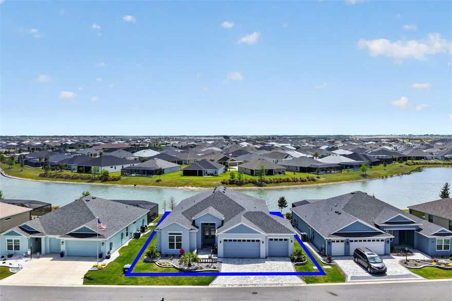 Expanded Premier Egret with stunning water views, ideally located between Eastport and Middleton. This 2,459 sq ft home sits on a premium lot overlooking a long pond, offering privacy and a peaceful setting away from road and recreation noise. Open floor plan with 10 foot ceilings and ceramic tile throughout (no carpet). Enjoy the oversized 52’ x 15’ east-facing lanai—perfect for relaxing or entertaining. Stretched 3-car garage (~900 sq ft) with epoxy floors provides space for cars, golf carts and storage. Paver driveway, professional landscaping, custom finished closets, attic stairs. Optional hot tub and safe. Available furnished or unfurnished. Closing after July 18. This water front home checks all the boxes!