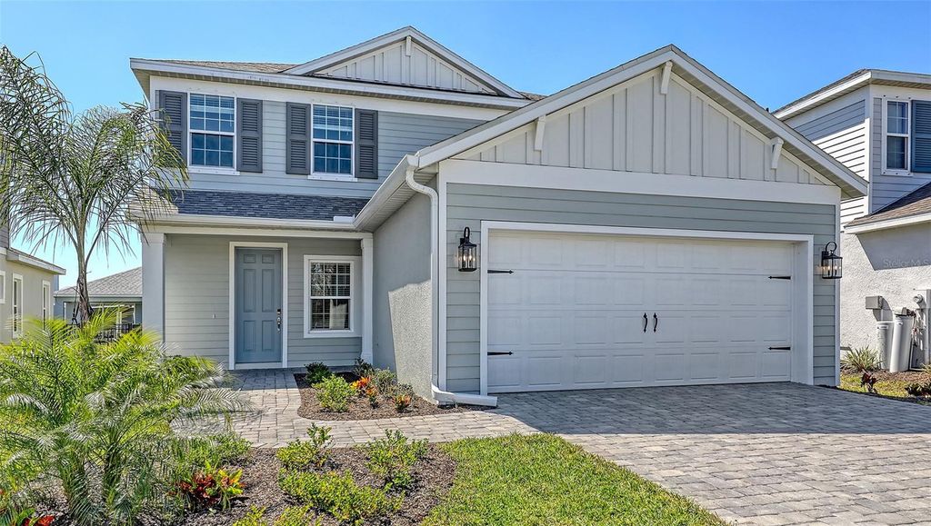 Photo of 10145 Spruce River Way, Parrish, FL 34219 (MLS # A4618960)