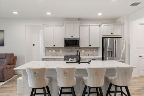 Tiny photo for 2013 Valencia Blossom Street, Clermont, FL 34711 (MLS # O6452203)