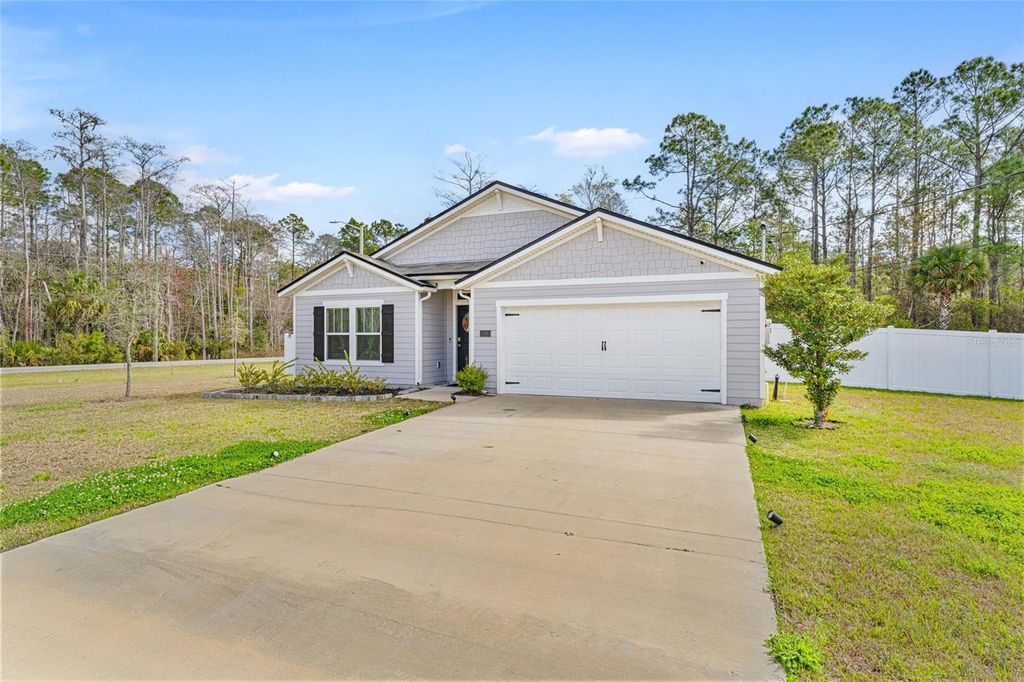 Photo of 118 Karas Trail, Palm Coast, FL 32164 (MLS # FC316776)