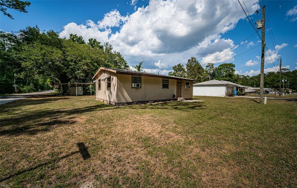 Photo of 6423 Bass Road, Weeki Wachee, FL 34607 (MLS # TB8379385)