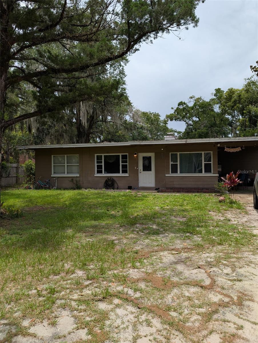 Big lot with trees and a fenced in yard. Beautiful Terrazzo floors throughout this 3 bedroom, 2 bath home located close to 417 and I-4. Good rental property investment opportunity.