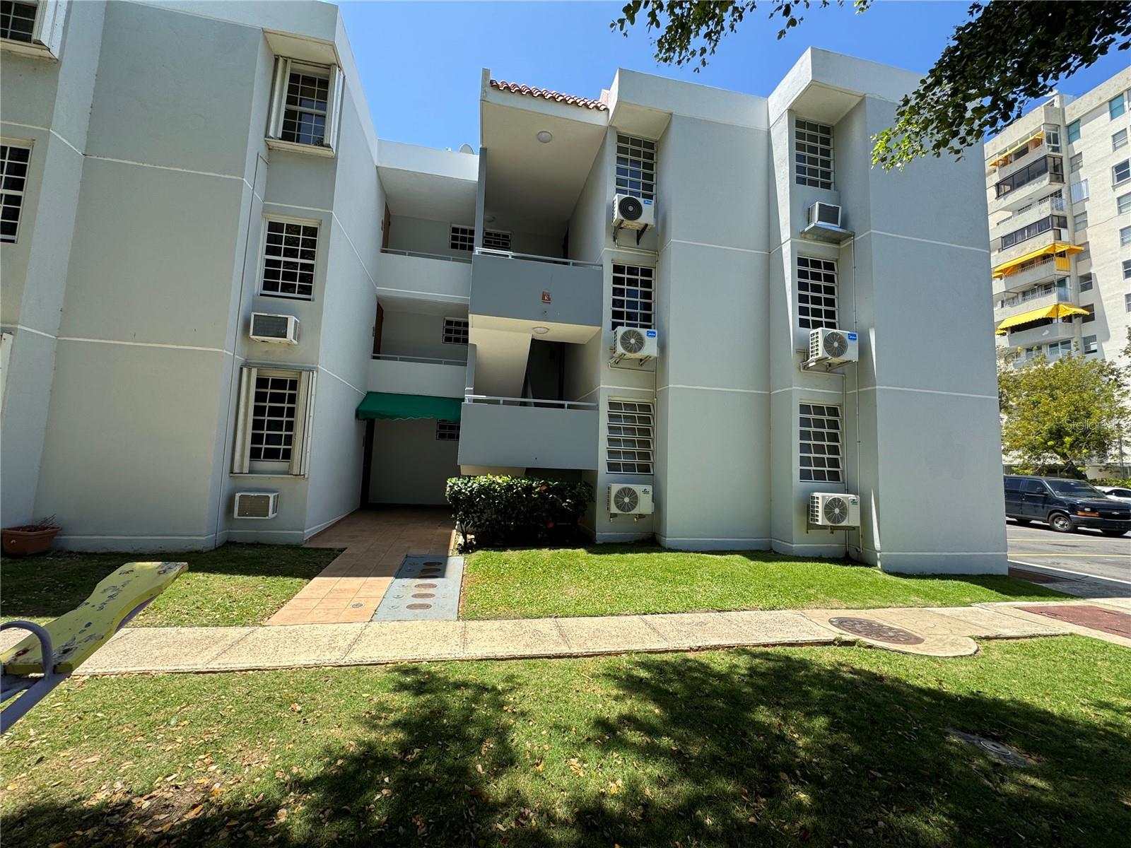 Welcome to your dream home in Costa del Sol, Isla Verde, one of the most desirable beachfront communities in Puerto Rico. This spacious 3-bedroom, 2-bathroom apartment is just steps from the stunning Isla Verde Beach, combining comfort, convenience, and resort-style living. The unit is in its original condition, presenting a great opportunity to remodel and customize it to your taste. The layout features a functional design with a comfortable master bedroom, standard closets, and well-distributed living spaces. It is sold with essential appliances, including a washer, dryer, stove, oven, microwave, and air conditioning units in the bedrooms.
Residents of Costa del Sol enjoy a variety of resort-style amenities, including 24/7 security in a gated community, a large swimming pool, a tennis court, and a gazebo surrounded by beautifully landscaped green spaces. These features create a peaceful and safe environment for homeowners looking for a relaxed coastal lifestyle.
Located in the heart of Isla Verde, this home is close to supermarkets, restaurants, banks, pharmacies, and entertainment venues. The Luis Muñoz MarÃn International Airport is just 10 minutes away, making travel easy and convenient. For those who love history and culture, Old San Juan is a short 15-minute drive, with its charming cobblestone streets, vibrant nightlife, and historic landmarks. Whether you’re looking for a primary residence or a vacation home, this property provides easy access to everything around Isla Verde.
The monthly HOA fee is $246, and short-term rentals are not allowed, ensuring a tranquil residential atmosphere. Don’t miss this opportunity to own a piece of paradise and transform this apartment into your ideal home. Contact us today to schedule a private showing!