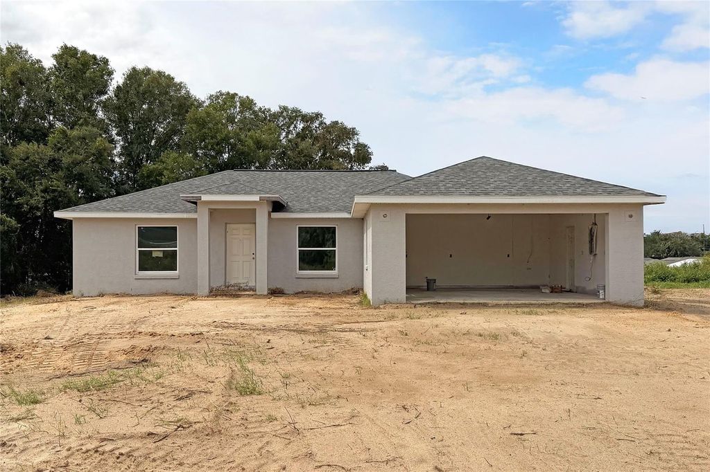 Photo of 102 N Dupont Terrace, Inverness, FL 34453 (MLS # O6352332)