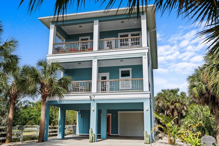 Coastal living at its finest! This custom-built, three-story retreat offers an unbeatable blend of quality craftsmanship, stunning water views, and prime beachside convenience! Enjoy breathtaking Intracoastal view sunsets, sunrises and ocean breezes from expansive covered decks on both the second and third floors. Decks are Fiber glassed like a boat and will never leak! You’ll have private deeded beach access just steps away, allowing you to have your toes in the sand within minutes. With 5 bedrooms, 2.5 bathrooms, and over 3,200 sq. ft. of thoughtfully designed living space, this home is built for both comfort and entertaining. Designed with durability and efficiency in mind, this home is concrete-sided, including soffits for hurricane protection and strategically set back on the lot to maximize unobstructed views. 10 ft ceilings on all floors to optimize third floor views with a low-profile roof, for low wind-impact. Two zone HVAC. All walls and floors between levels are insulated for quiet and peaceful enjoyment within all the individual spaces and maximizing energy as well. The elevator shaft has already been built and pre-wired so it’s ready to go for those who desire an elevator or simply leave them in their current use for tons of extra storage spaces! The third level is the heart of the home, featuring an elegant open-concept living area, a beautiful & functional kitchen with gorgeous backsplash, soft-close cabinetry, walk-in pantry providing ample storage. Cozy up by the fireplace and soak in the serene coastal ambiance. For convenience, there is also a guest half bath on this level. The large primary suite will be where you love to unwind after a long day with its spacious yet warm space which includes plenty of closet space and a fabulous oversized upgraded designer tiled walk-in shower. The second level hosts a full bathroom and four guest rooms, each with private balcony access while the first-floor office/den opens to the backyard, perfect for enjoying Flagler Beach’s captivating sea breezes. Not to mention over 30 palm trees for just an absolute tropical, inviting vibe that you will long to get home to each day! With a one-car garage, two covered parking spaces, and a spacious driveway for extra vehicles and all your water enthusiast toys, this home offers the ultimate Florida lifestyle in a tucked-away location just off Ocean Shore Blvd. Don't miss this rare opportunity to own a stunning coastal escape in beautiful Flagler Beach! Flagler Beach offers six miles of uncrowded shoreline, ocean view dining, parks, fishing spots, surf-able waves and a friendly laid-back atmosphere just south of St. Augustine and just north of Ormond/Daytona Beach. A short drive away to the center of town, near dining, shopping and more. This home will be where your heart is, do not delay! Your private tour of your new home is awaiting!