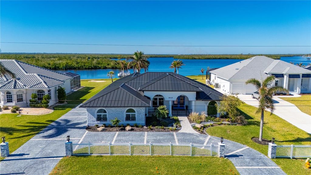 Photo of 5117 Collingswood Boulevard, Port Charlotte, FL 33948 (MLS # C7513898)