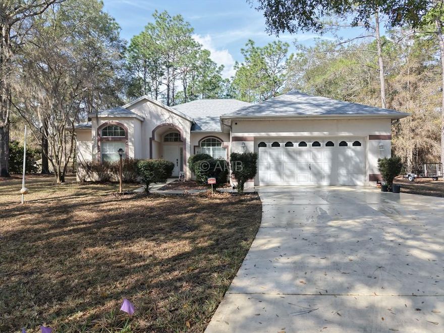 Trails, Pickleball & the Rainbow River - This is YOUR life!  Welcome to the Woodlands at Rainbow Springs — where nature, luxury, and community converge!  BE SURE TO TAKE THE 360 INTERIOR & EXTERIOR TOUR TO SEE FLOORPLAN AND EXTERIOR!
Nestled on a lush, private acre in the highly sought-after Woodlands community, this stunning home offers the ultimate Florida lifestyle. Step outside your front door and find yourself directly across from scenic walking trails, while the incredible amenities of Rainbow Springs POA are right at your fingertips — including private access to the breathtaking Rainbow River, a resort-style pool, clubhouse, fitness center, restaurant, and tennis and pickleball courts. This is resort living, every single day.
Inside, you'll love the brand-new luxury vinyl flooring flowing through the main living areas, giving the home a fresh, modern feel. Out back, your screened lanai invites you to unwind while soaking in serene, wooded views — your own private retreat. Major updates are already done for you, including a new roof (2023), so you can move in with total peace of mind.
The oversized lot is equipped with a sprinkler system on well, rain gutters for low-maintenance living, and an expansive driveway with ample parking for family and guests alike.
Whether you're a nature lover, an active community enthusiast, or simply someone who appreciates the finer things — this home checks every box. Opportunities like this in Rainbow Springs don't last long. Schedule your private showing today!