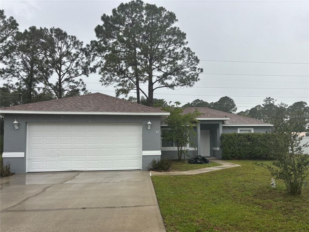 Photo of 24 Seven Wonders Trail, Palm Coast, FL 32164 (MLS # FC318474)