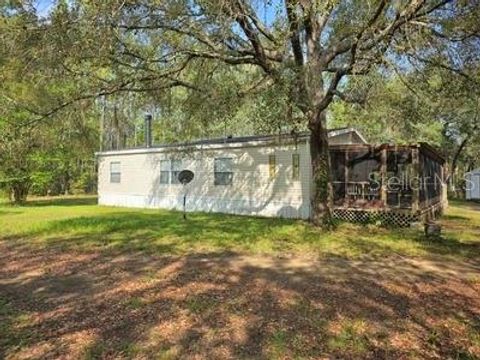 Photo of 12350 NE 101st Court, Archer, FL 32618 (MLS # GC531473)