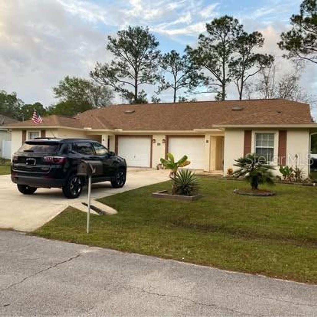 Photo of 20 Whetstone Lane #B, Palm Coast, FL 32164 (MLS # FC316725)
