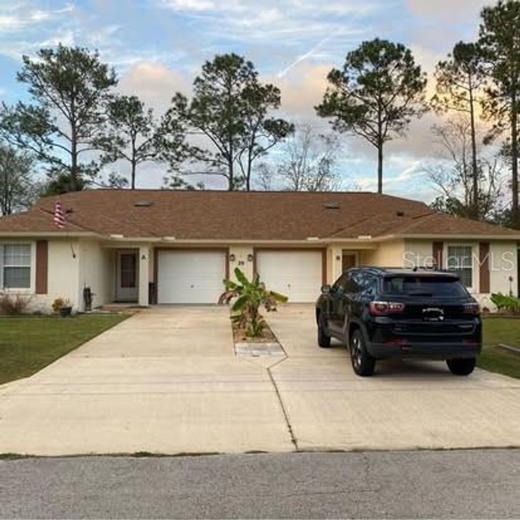 Photo of 20 Whetstone Lane #B, Palm Coast, FL 32164 (MLS # FC316725)