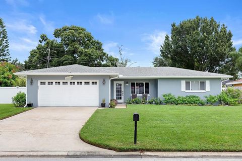 A home in BELLEAIR BLUFFS