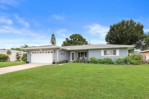 A home in BELLEAIR BLUFFS